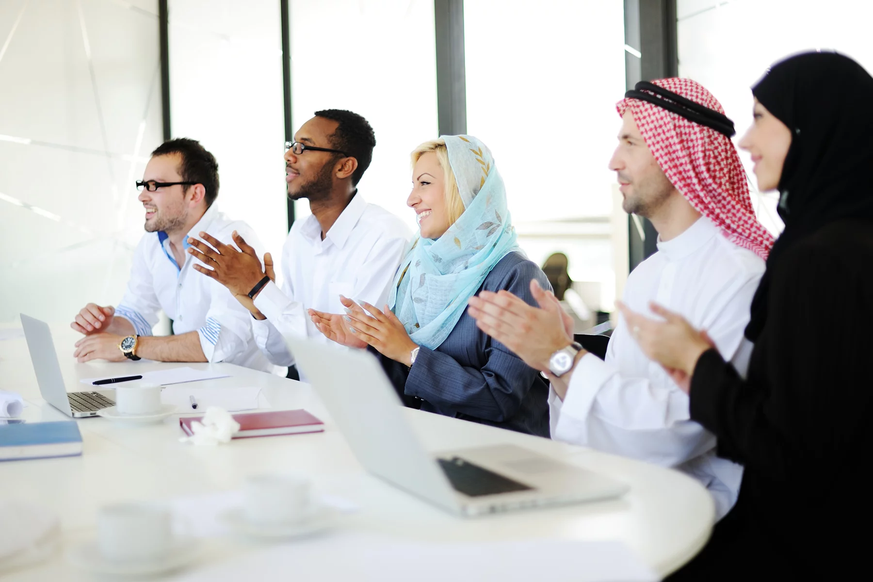 Saudi business professionals collaborating